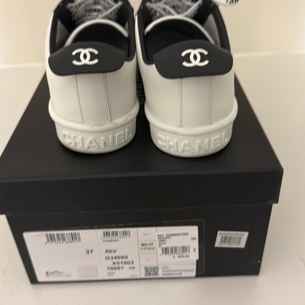 Excellent condition Chanel sneakers size 7 worn twice only